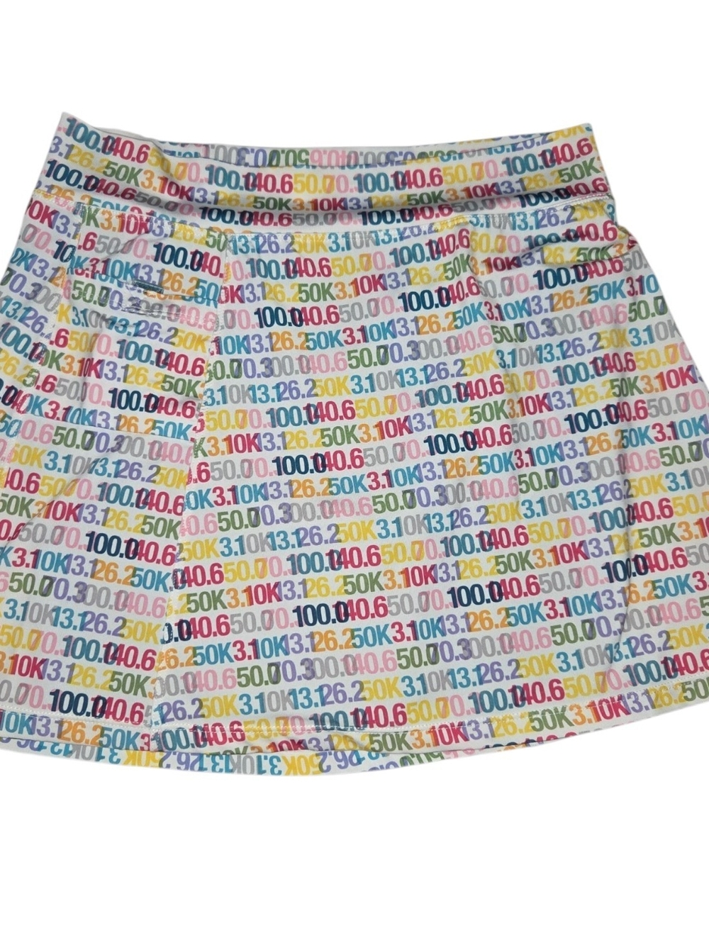 Running Skirt features a vibrant, multi-colored race distance graphic print 3